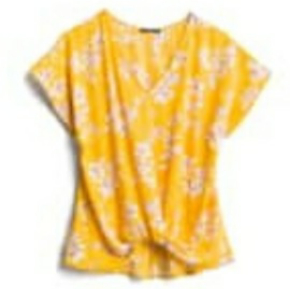 yellow blouse with knot accent at waist